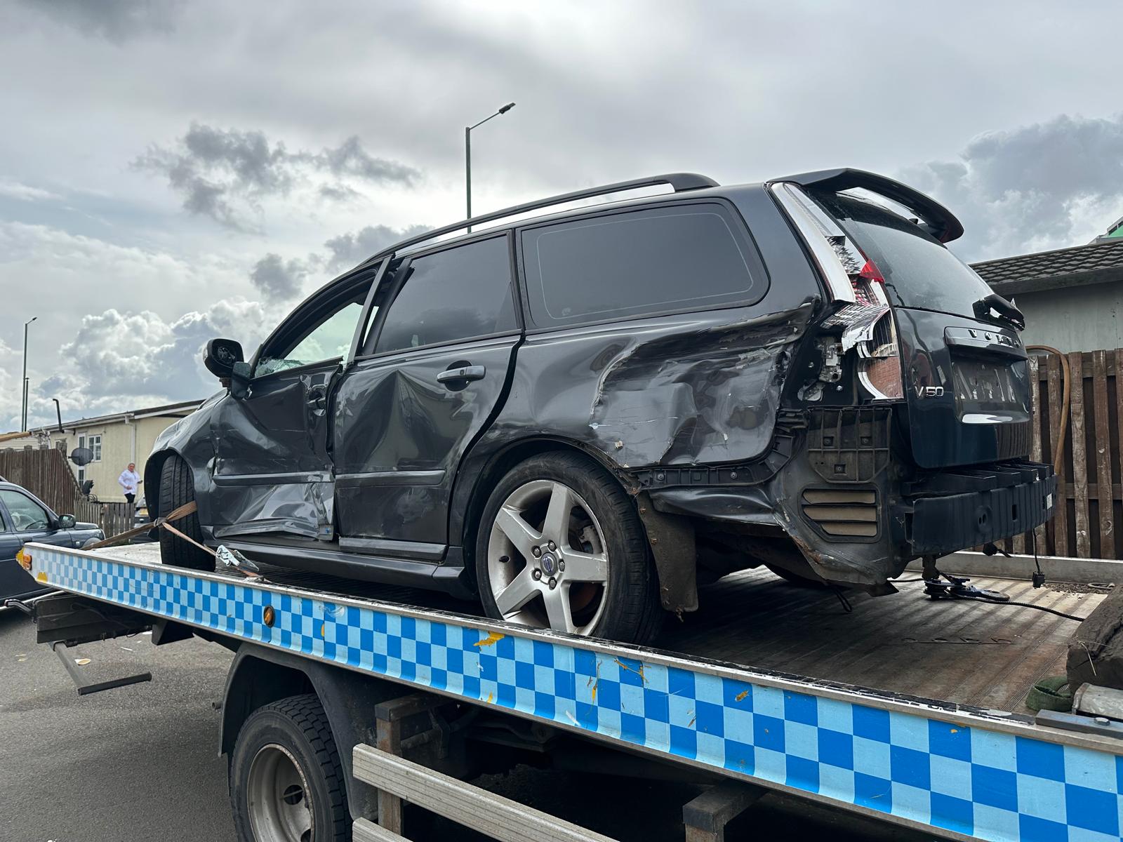 Crashed volvo on the back of a recovery truck